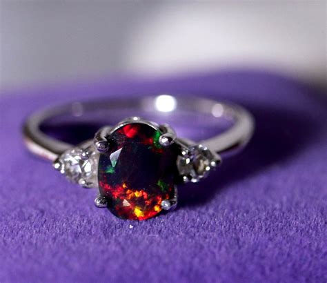 ysl womens ring black opal|YSL brooches and rings.